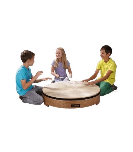 A large wooden drum with mallets resting on top, inviting children to explore rhythm and music-making together.