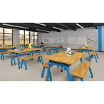 A classroom filled with Works Butcher Block Tables, providing versatile workspaces for makerspace activities and projects.