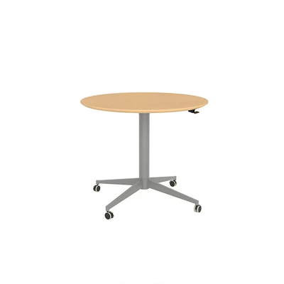 A modern and ergonomic table with seamless transitions between sitting and standing positions